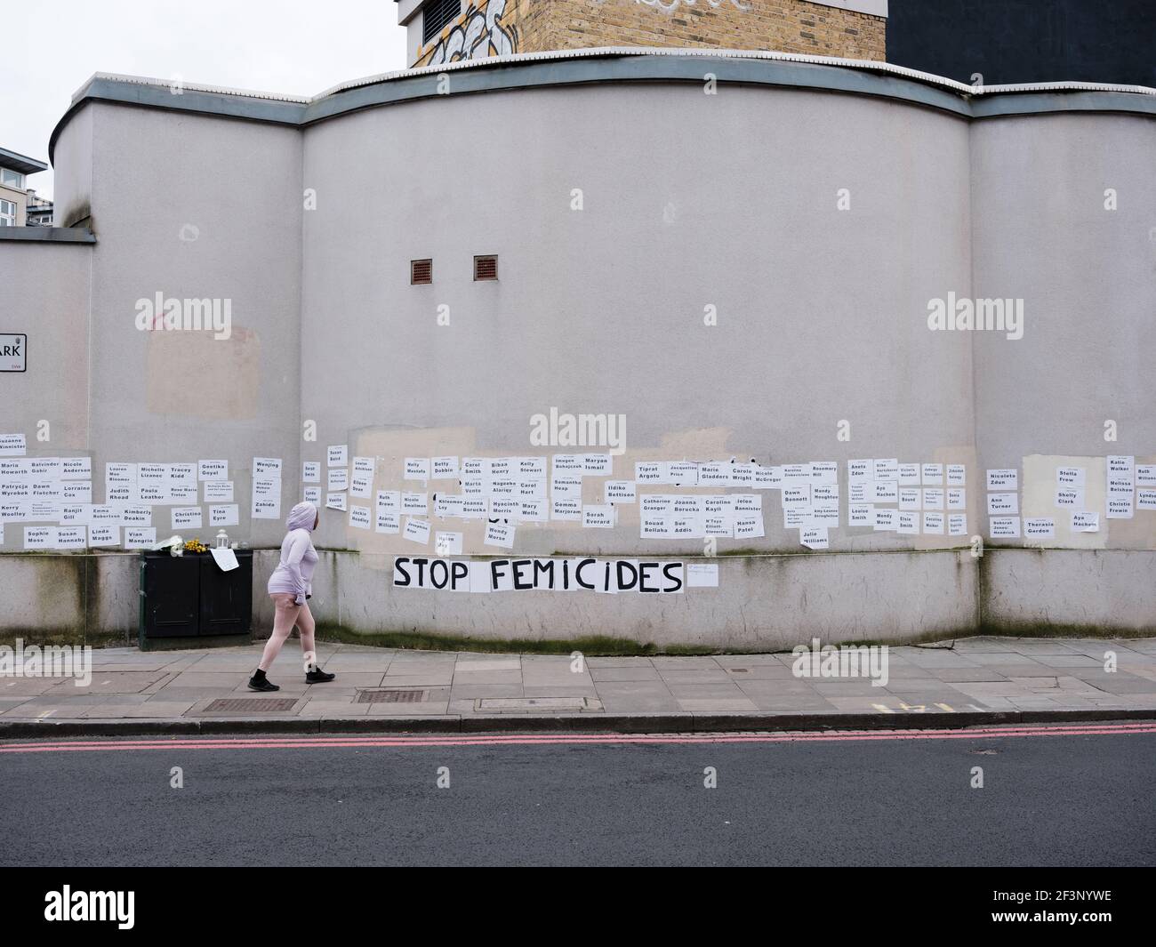 The names of women and their children who have been murdered in the United Kingdom pasted to the side of a building in Clapham, March 14, 2021 Stock Photo