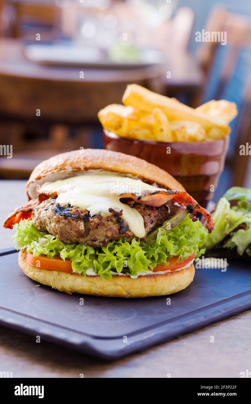 Burger and Chips served at a pub Stock Photo