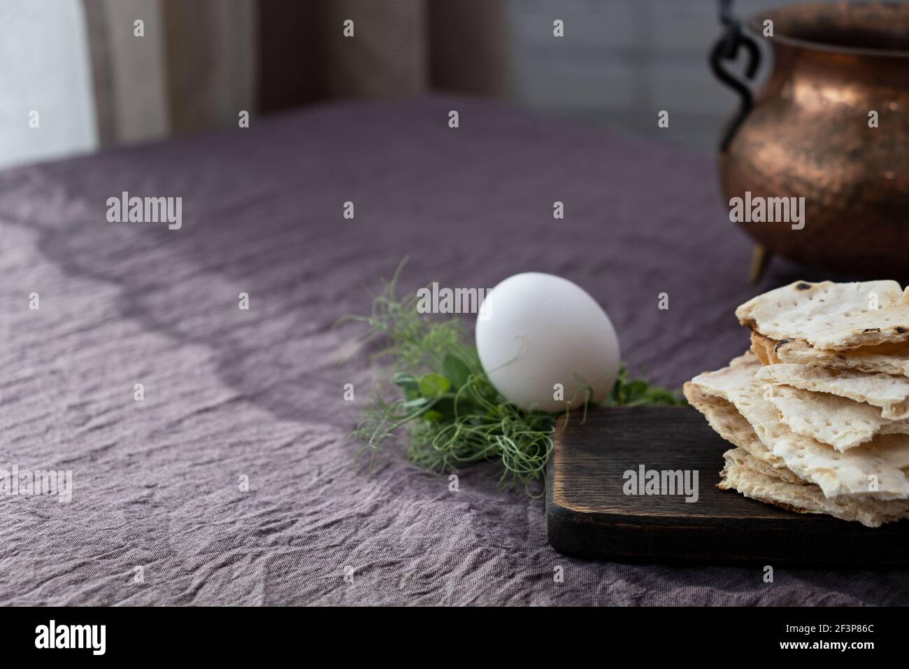 Homemade matzo with microgreen peas. Unleavened flatbread bread. Pesah