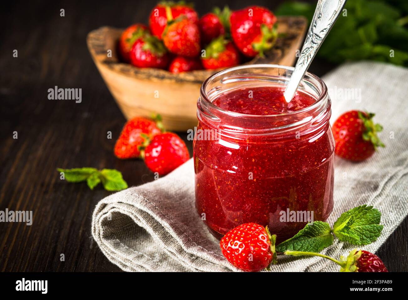 Strawberry jam in the glass jar Stock Photo - Alamy