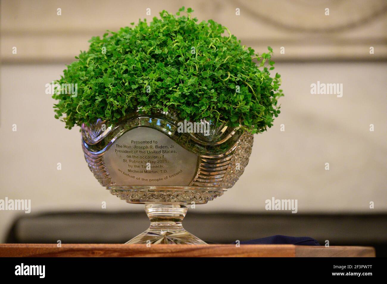 A St. Patrick's day gift from Ireland's Prime Minister Micheál Martin is seen in the Oval Office as U.S. President Joe Biden participates in a virtual bilateral meeting with Martin at the White House in Washington, U.S., March 17, 2021. Credit: Sipa USA/Alamy Live News Stock Photo