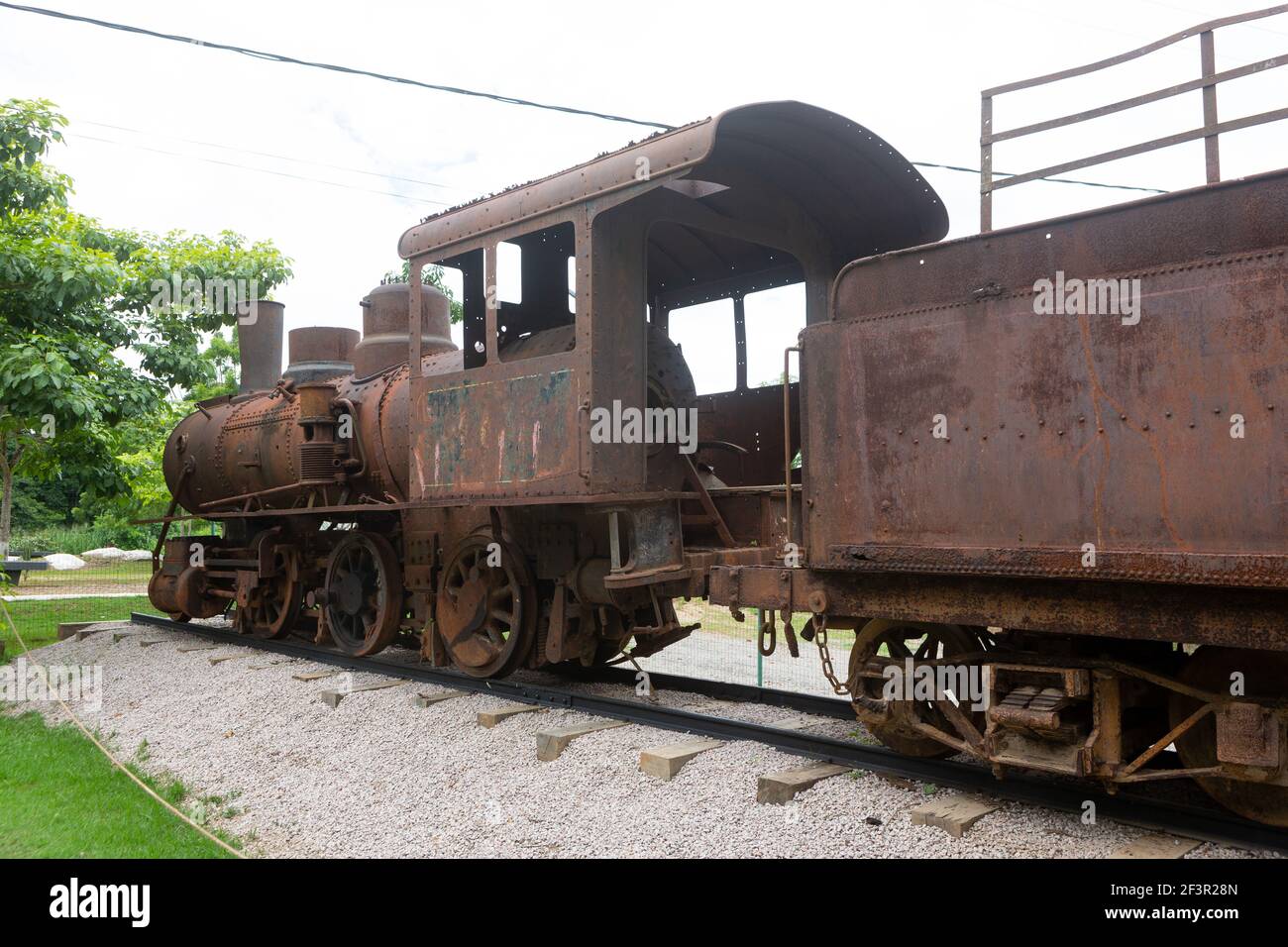 Locomotive and train wagon of the old Madeira Mamoré Railway, known as ...