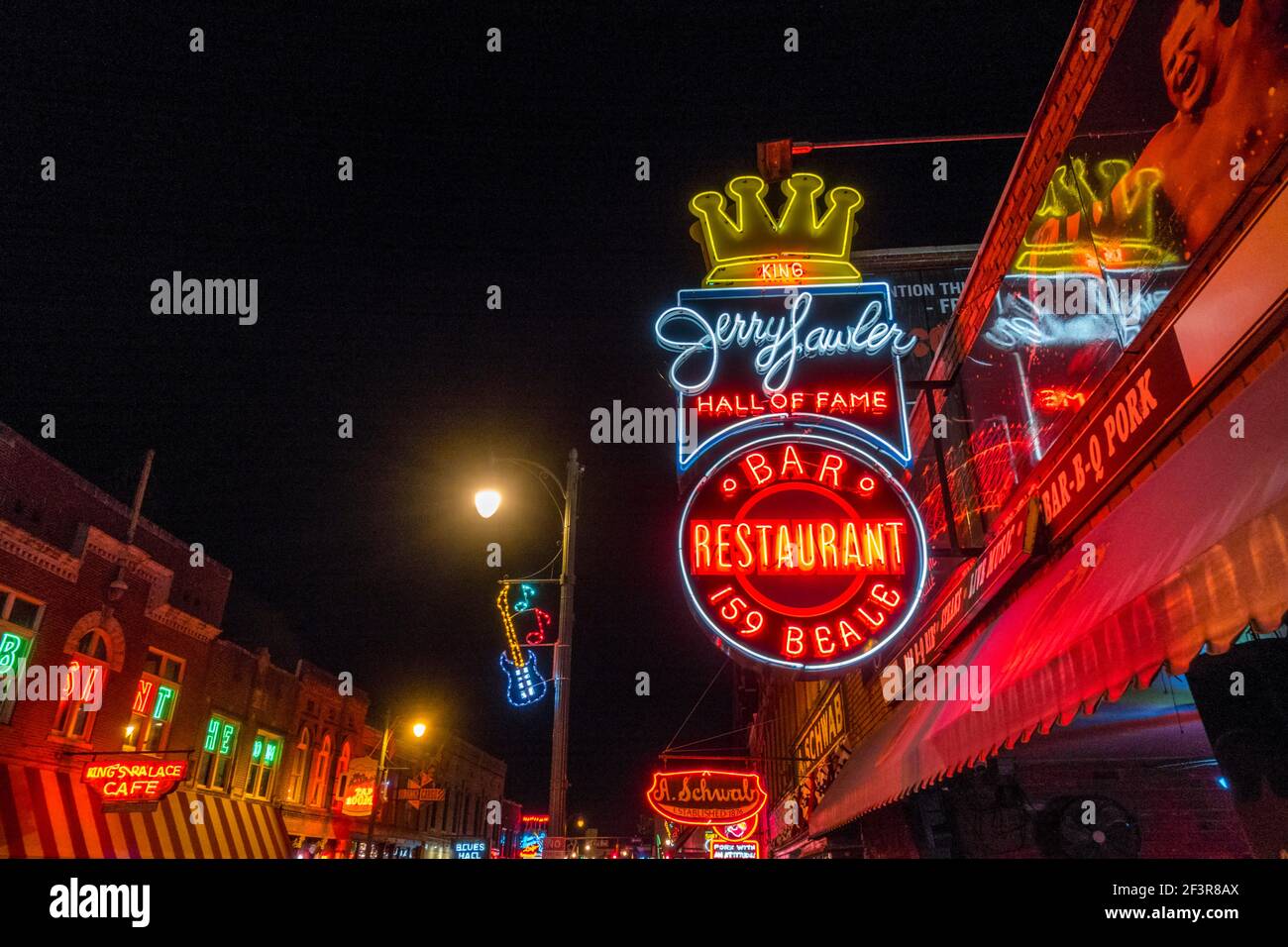 Neon lights on the front of bars on Beale St Memphis Tennessee Stock