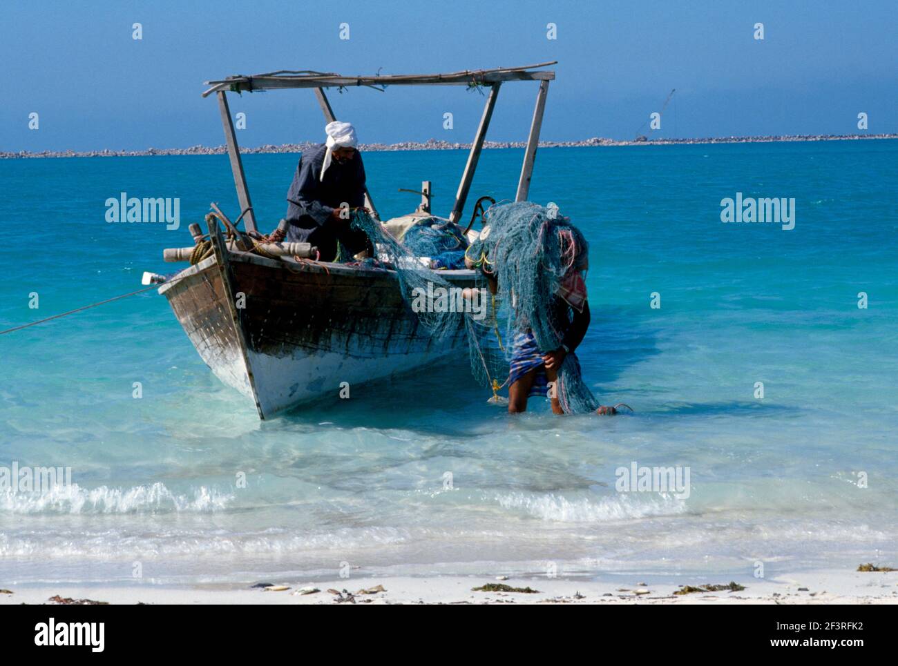 Dubai UAE Fisherman and Fishing Boat Stock Photo Alamy