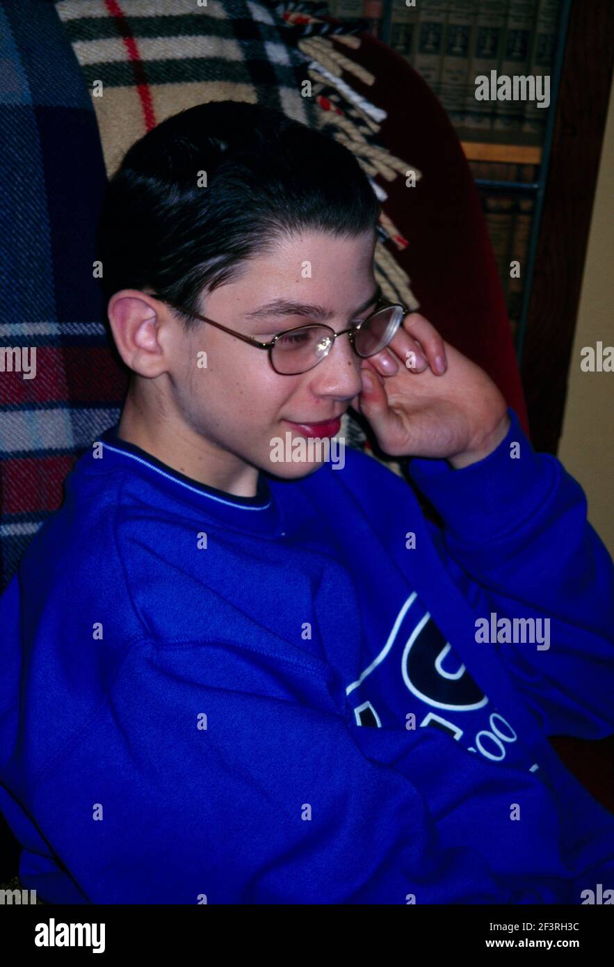 13 Year Old Boy with Dark Brown Hair Stock Photo