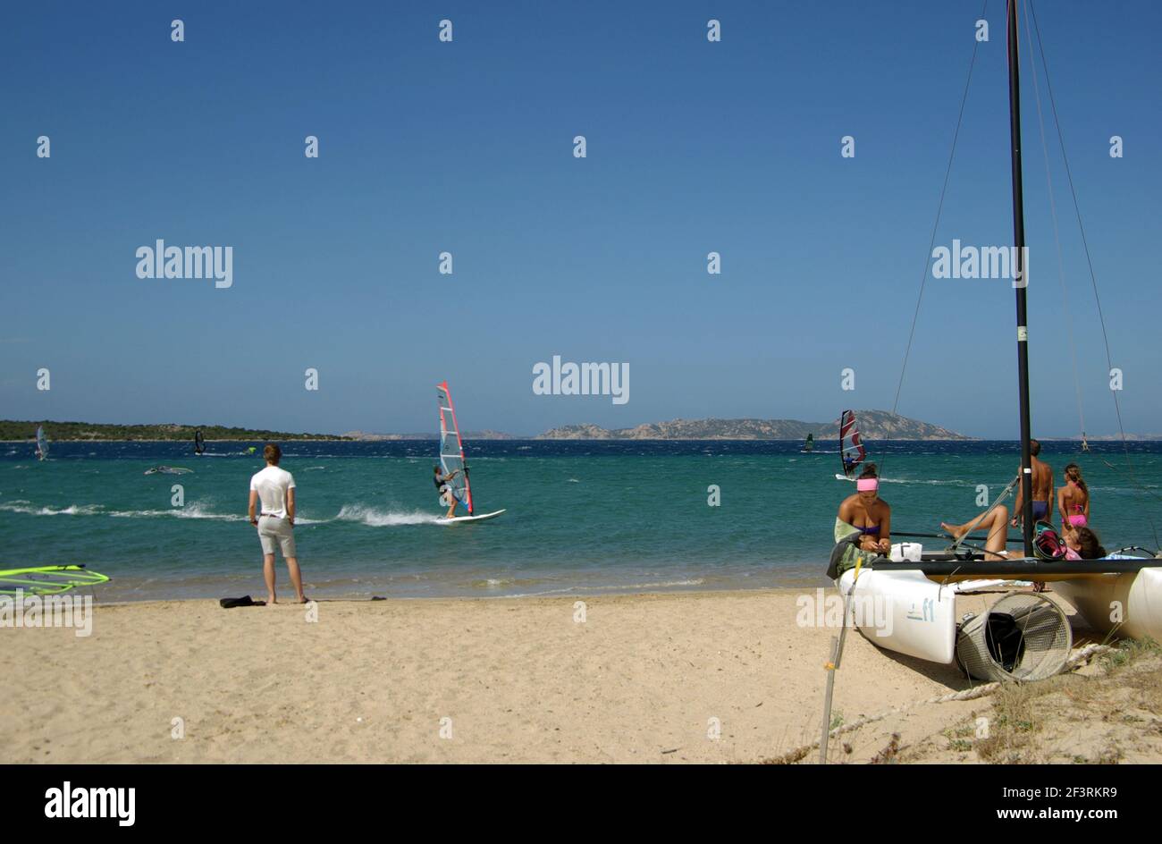 Windsurfing in Porto Pollo beach, Palau, Sardinia, Italy Stock Photo