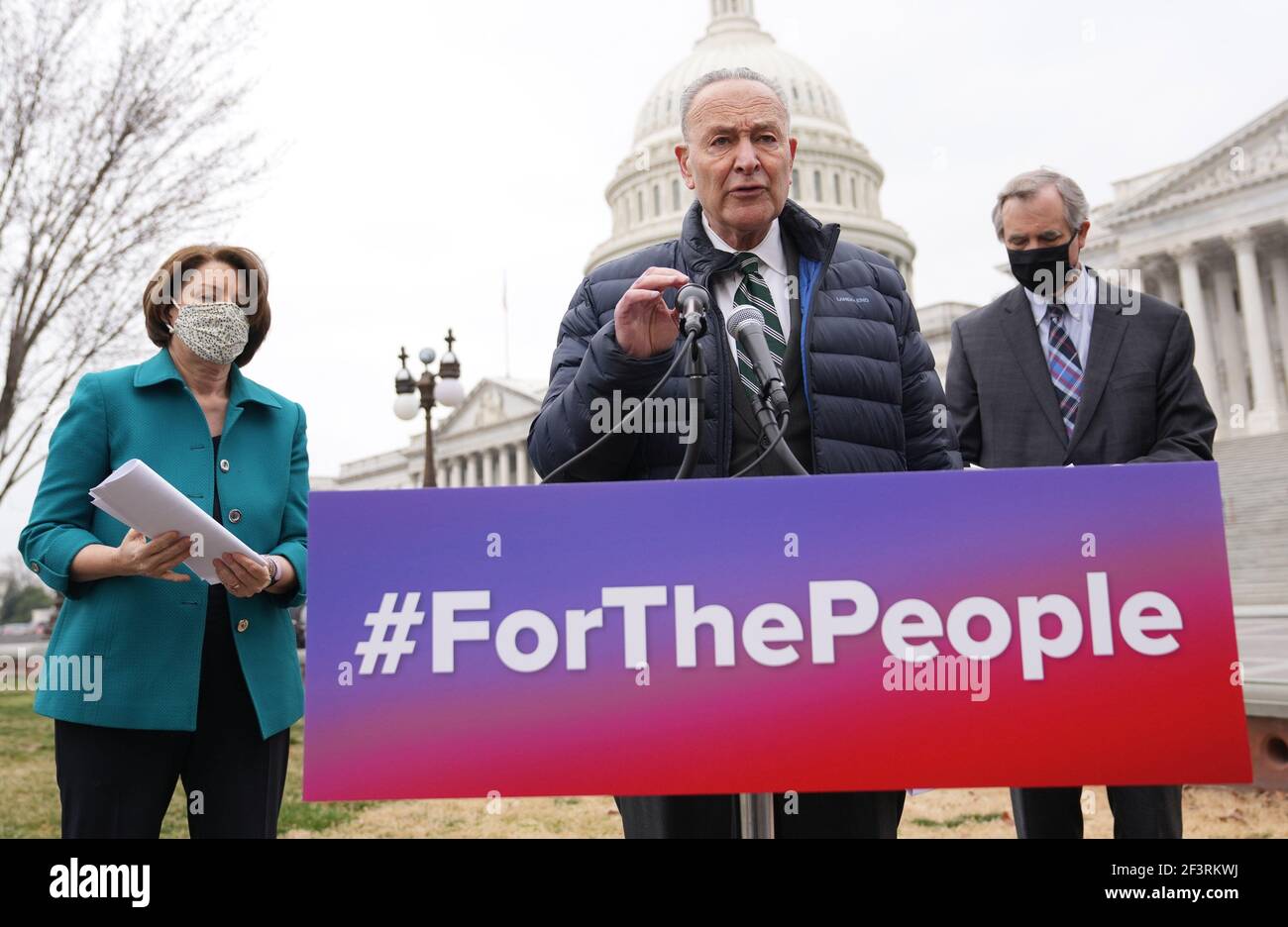 Washington, United States. 17th Mar, 2021. Senate Majority Leader Chuck Schumer, D-N.Y., (C) speaks alogonsdie Sen. Amy Klobuchar, D-MN, and Sen. Jeff Merkley, D-OR, at a news conference introducing S.1., the For the People Act in Washington, DC on Wednesday, March 17, 2021. The Act aims to expand voting rights, change campaign finance laws to reduce the influence of money in politics, limit partisan gerrymandering, and create new ethics rules for federal officeholders. Photo by Kevin Dietsch/UPI Credit: UPI/Alamy Live News Stock Photo