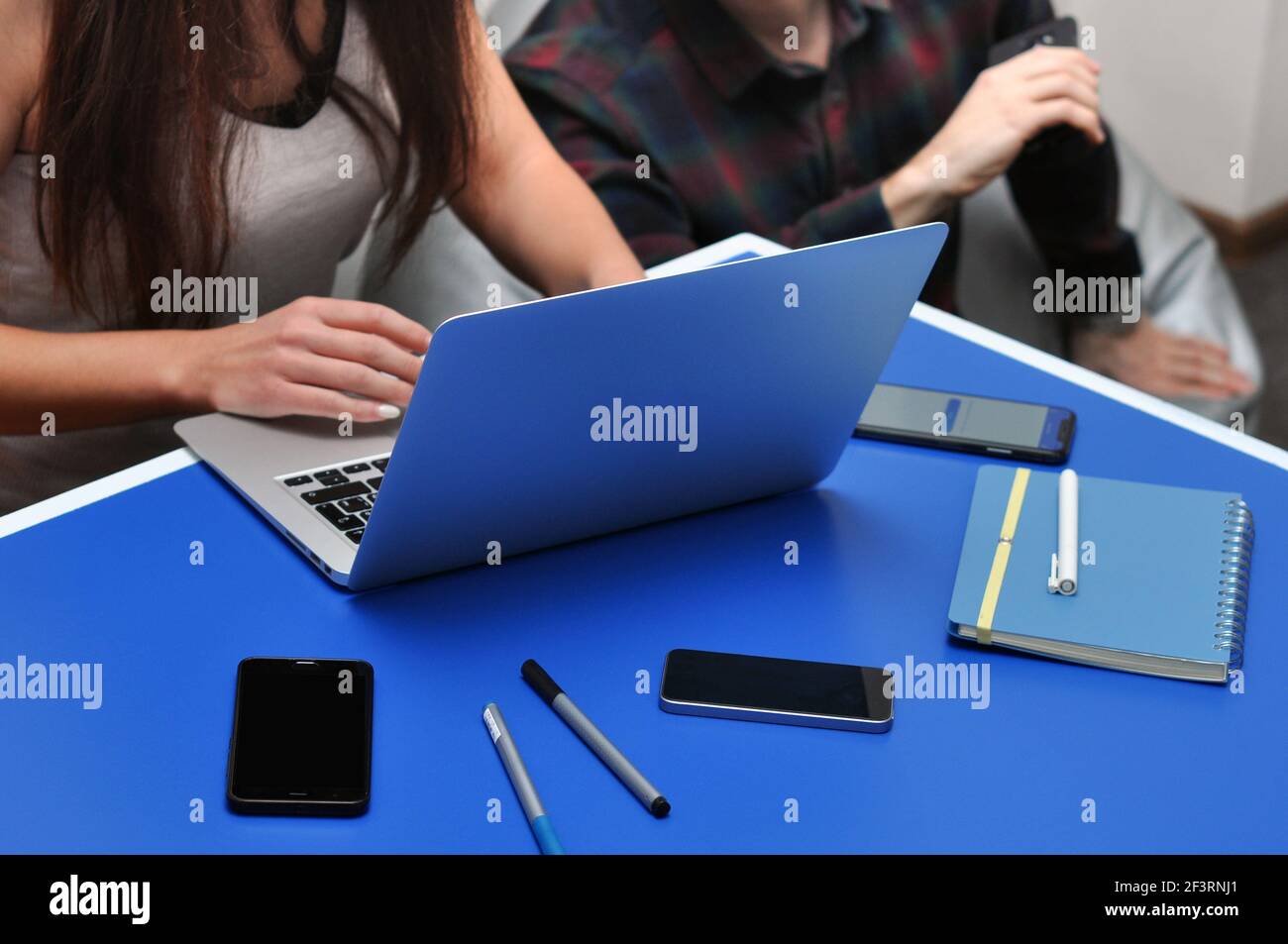 Programmer, Mobile Application Designers, Web Designer working at office. Teamwork and programming websites and mobile applications on the laptop. Stock Photo