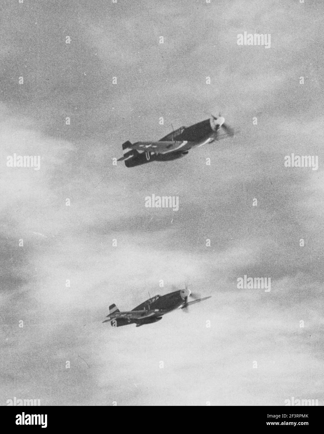 9th Air force North American P-51 'Mustangs' in flight Stock Photo