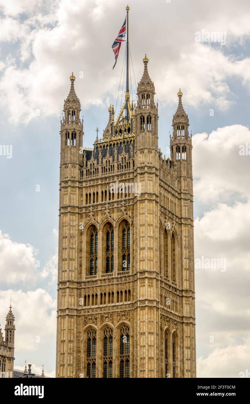 Union flag flying from the Victoria Tower on Palace of Westminster, London. Designed by Charles Barry in Perpendicular Gothic style, completed in 1860 Stock Photo