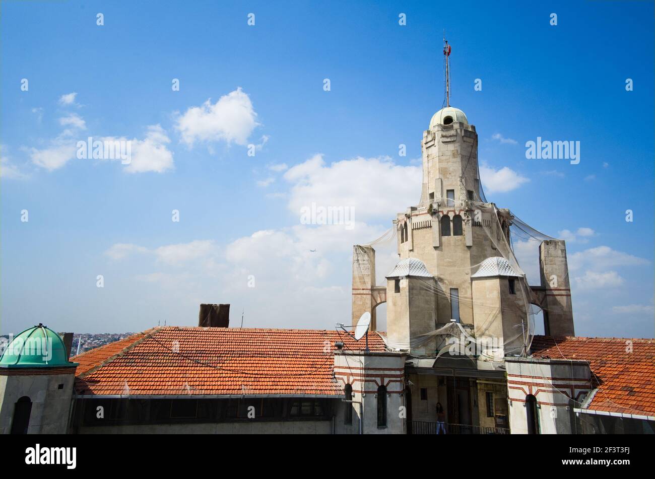Old historic tower building view from rooftop of Galata Konak cafe and restaurant. Beyoglu, Istanbul, Turkey Stock Photo