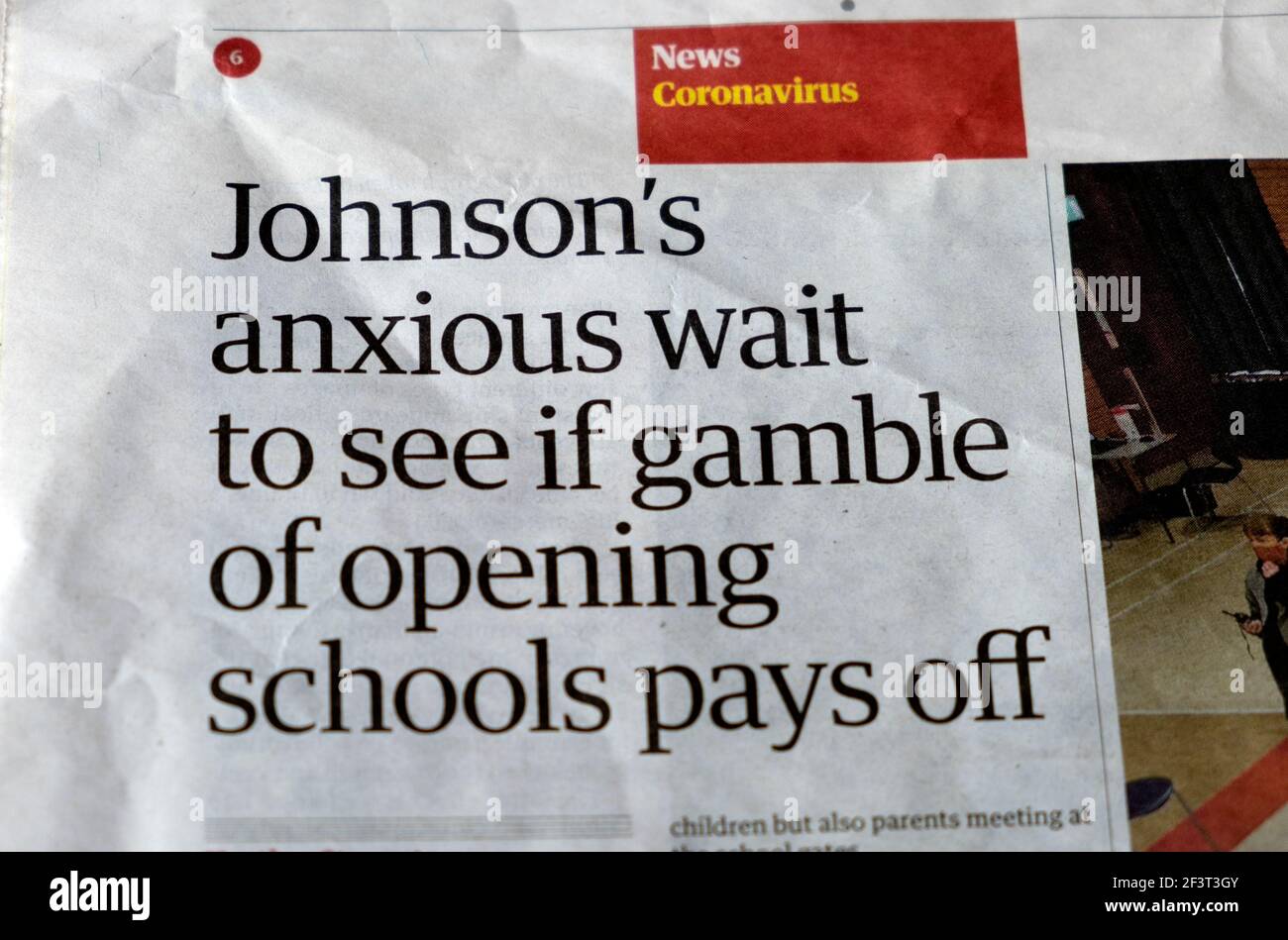 Boris 'Johnson's anxious wait to see if gamble of opening schools pays off' Guardian newspaper headline covid schools article 5 March 2021 in London Stock Photo