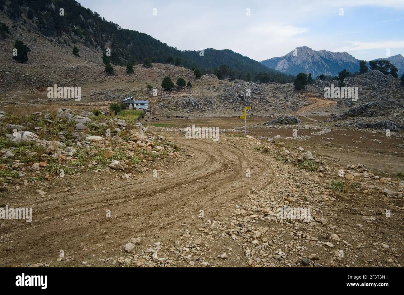 On the Lycian Way in rocky mountains in Turkey. Dirt road on the plateau. Stock Photo