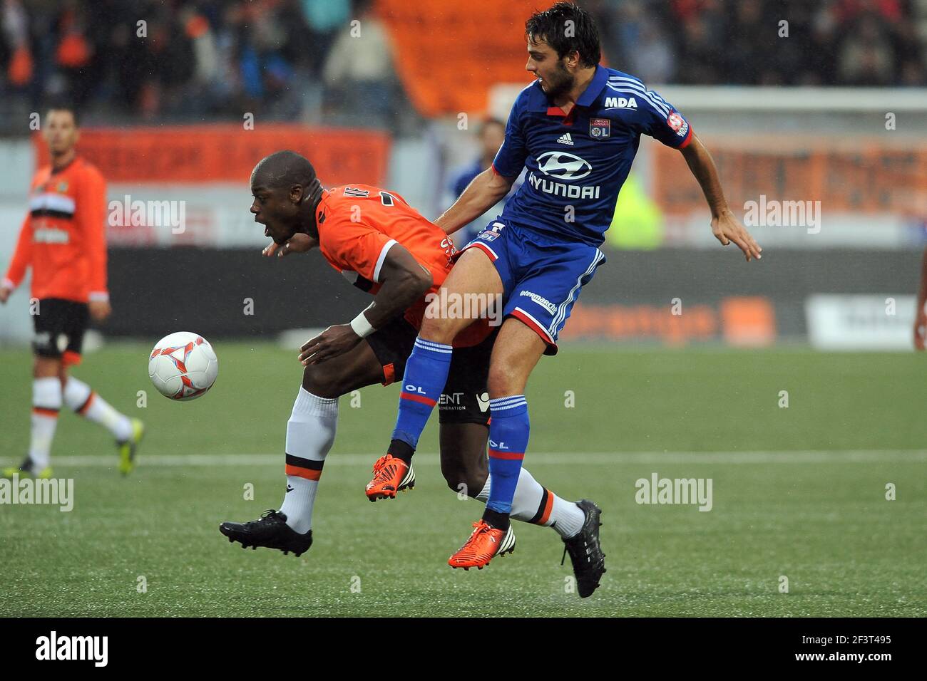 FOOTBALL - FRENCH CHAMPIONSHIP 2012/2013 - L1 - FC LORIENT v OLYMPIQUE LYONNAIS - 7/10/2012 - PHOTO PASCAL ALLEE / DPPI - LAMINE KONE (FCL) / CLEMENT GRENIER Stock Photo