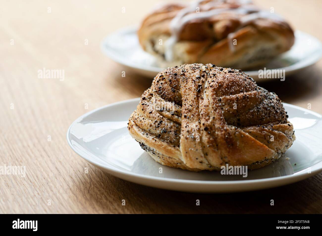 Time for Swedish coffee break with cinnamon bun and cardamon bun Stock Photo