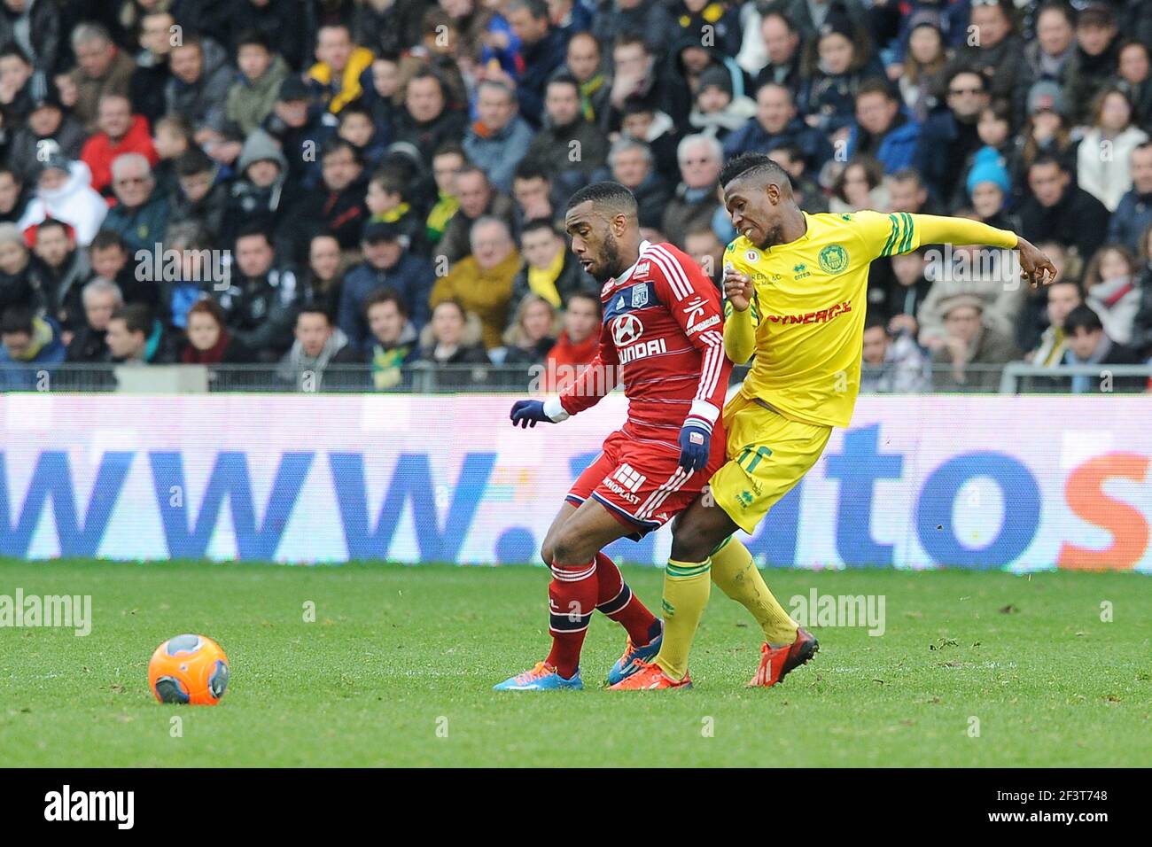 Alexandre LACAZETTE of Lyon against Birama TOURE of Nantes during the  French Championship L1 2013/2014 football match between FC Nantes and  Olympique Lyonnais on February 9, 2014 at La Beaujoire stadium in
