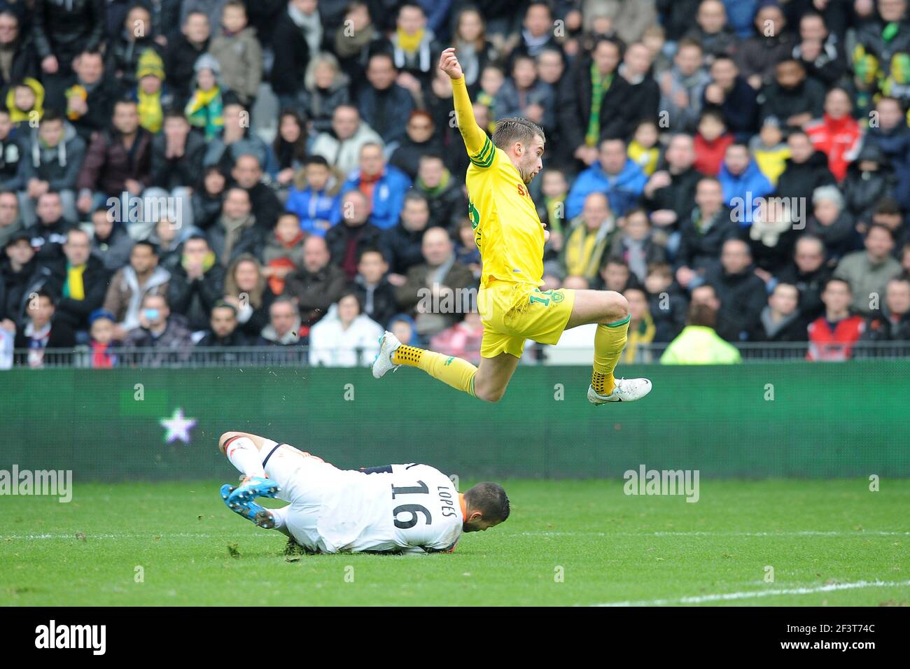 Lucas DEAUX of Nantes against Anthony LOPES of Lyon during the French  Championship L1 2013/2014 football match between FC Nantes and Olympique  Lyonnais on February 9, 2014 at La Beaujoire stadium in