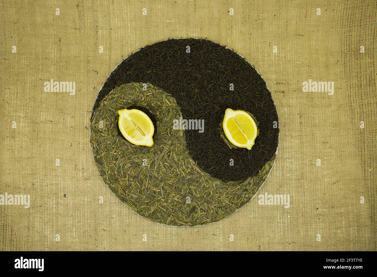 The concept of yin yang. Sign yin yang against the background of burlap