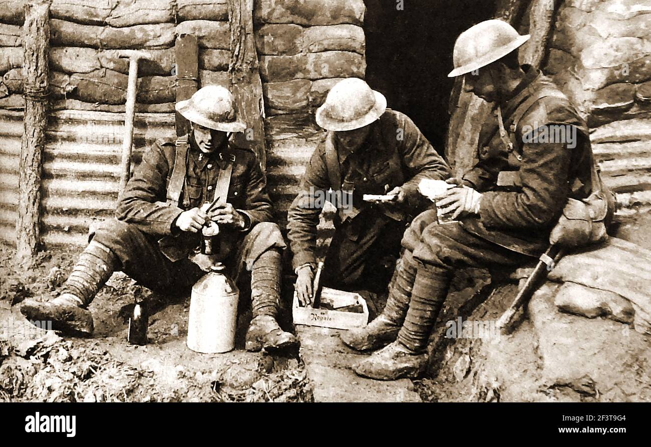 WWI - Trench warfare - Canadian troops preparing lunch only 50 yards from the German lines. Stock Photo