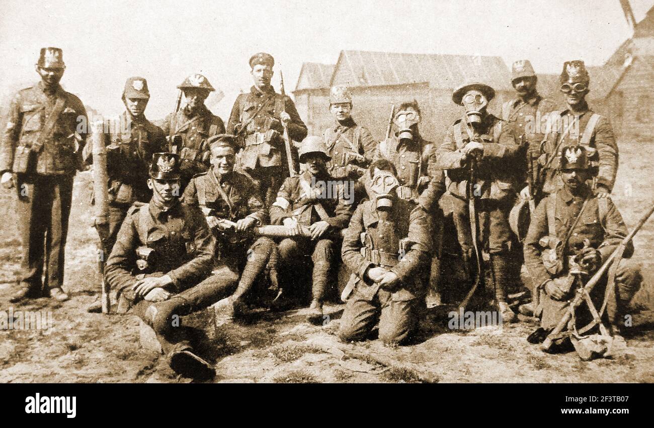 WWI - British soldiers dressed in uniforms and  holding  souvenirs captured from the enemy. Stock Photo