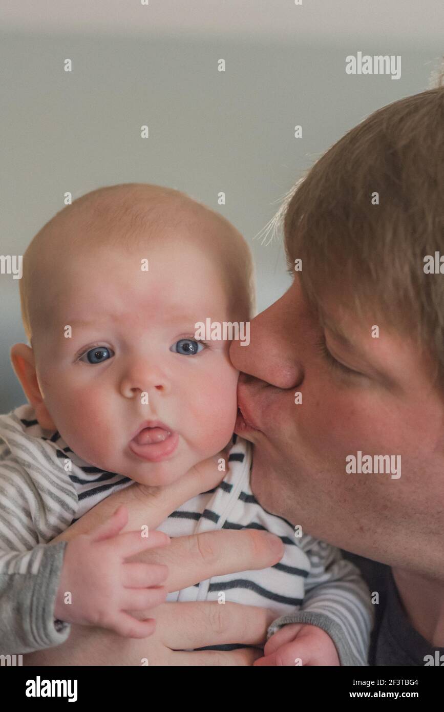 Baby with her father Stock Photo