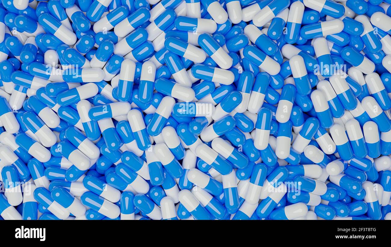 Blue and white capsules production. Pharmaceutical and medicine
