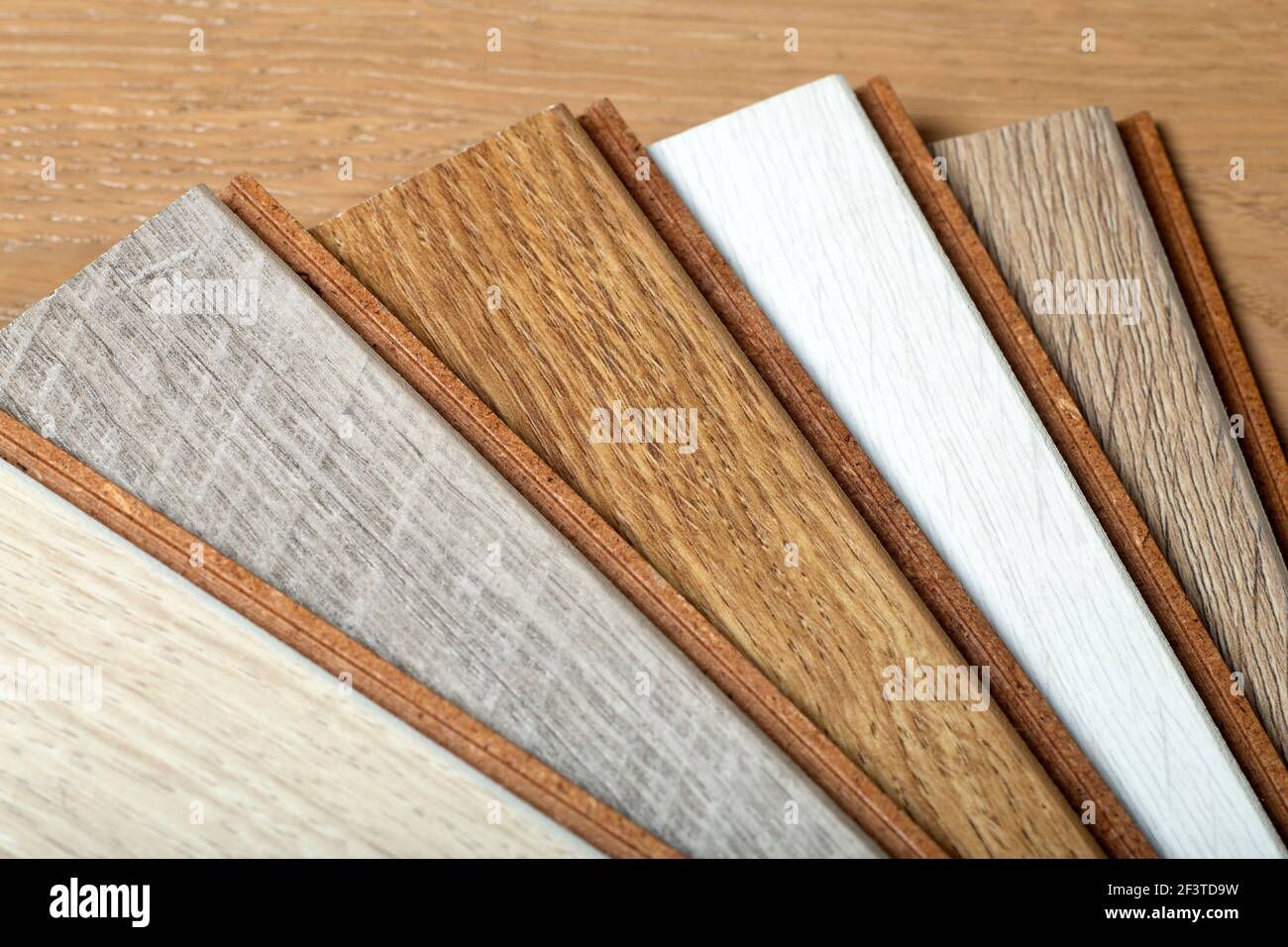 Laminate background. Samples of laminate or parquet with a pattern and wood  texture for flooring and interior design. Production of wooden floors Stock  Photo - Alamy
