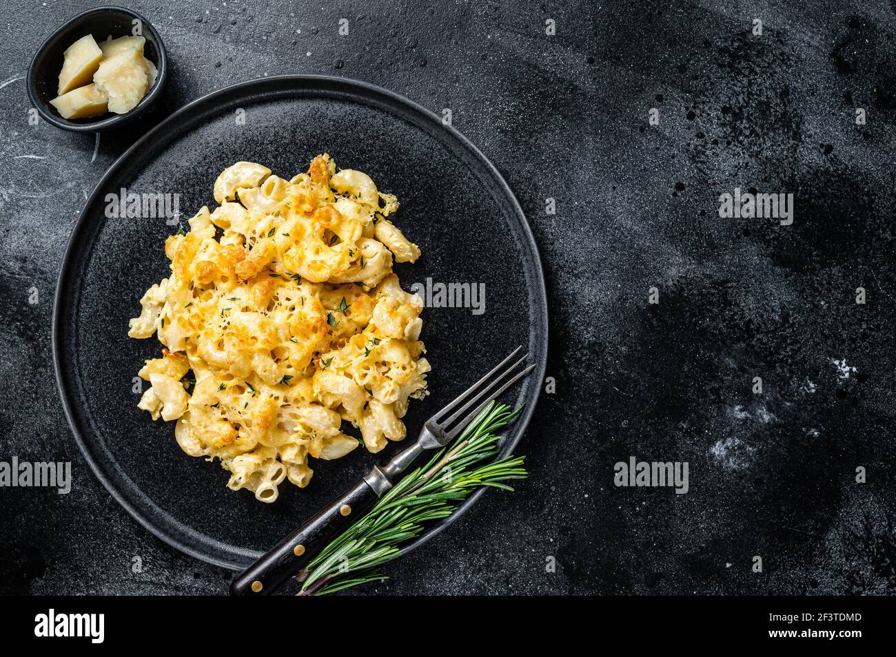 Baked Macaroni Mac and cheese American dish with Cheddar cheese sauce