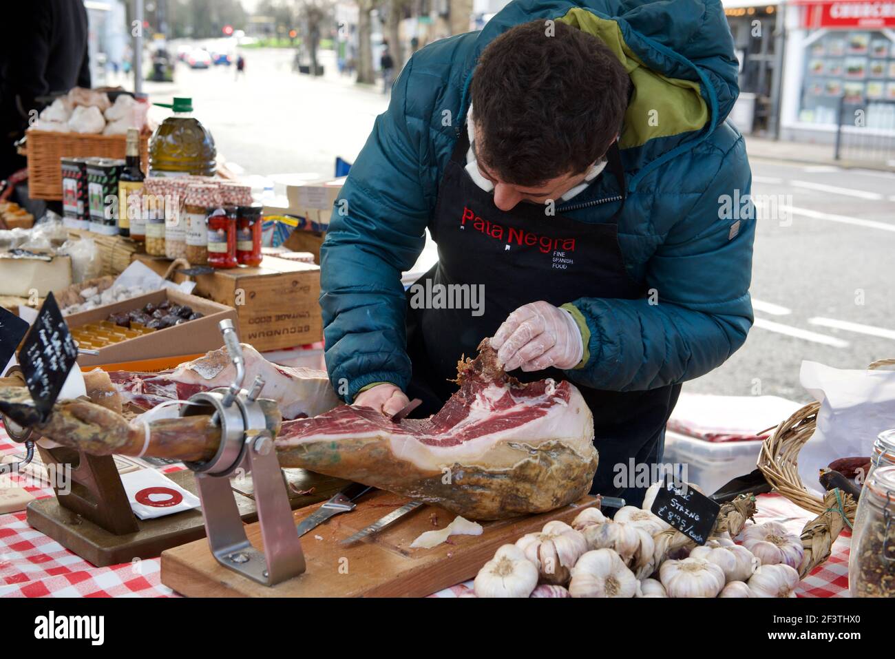 Serrano ham stall at Farmers Market Stock Photo
