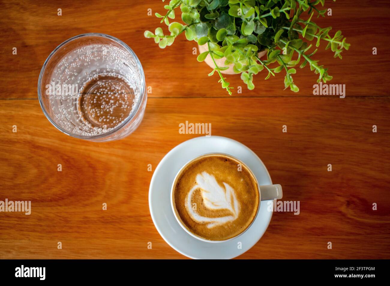 Coffee and glass of sparkling water Stock Photo Alamy