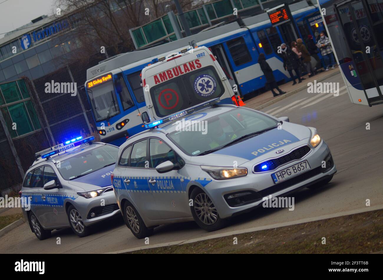 Accident involving streetcar and passenger - police, medical and traffic police cars. The place of the incident in Krakow Stock Photo