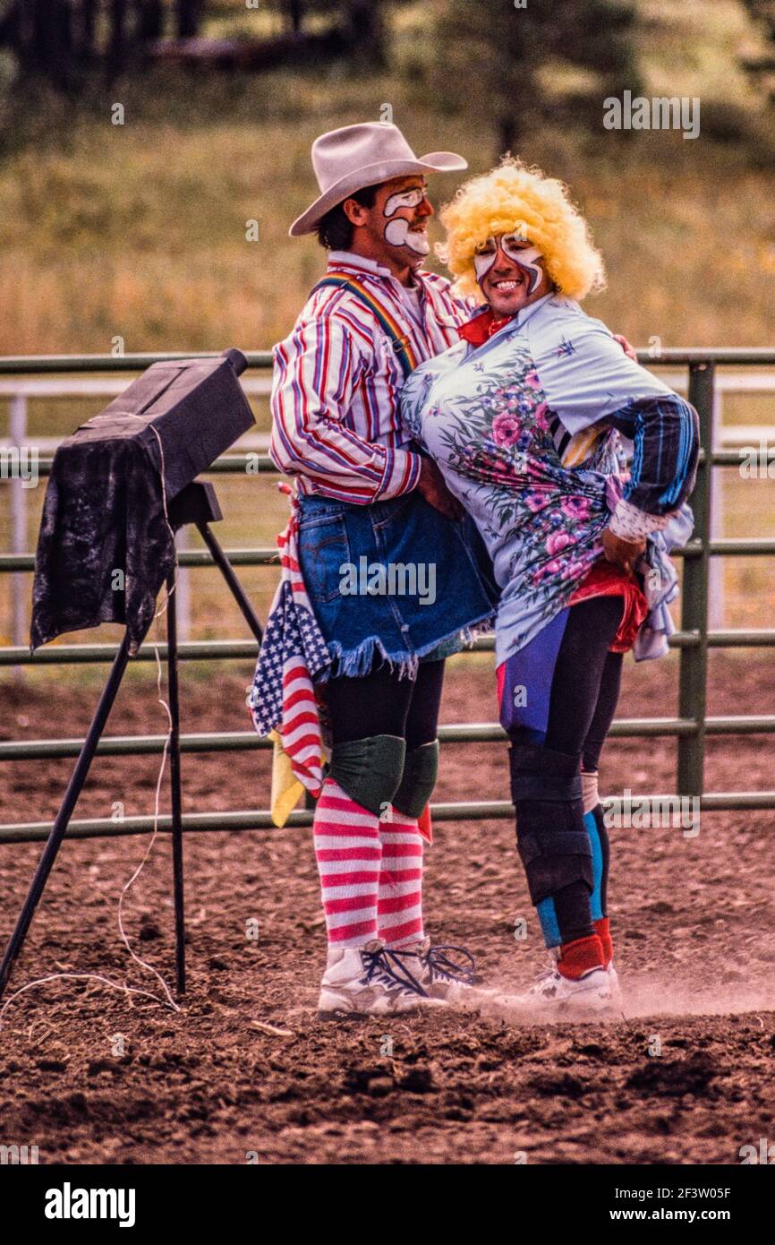 Two professional rodeo clowns or bullfighters in their face paint and ...