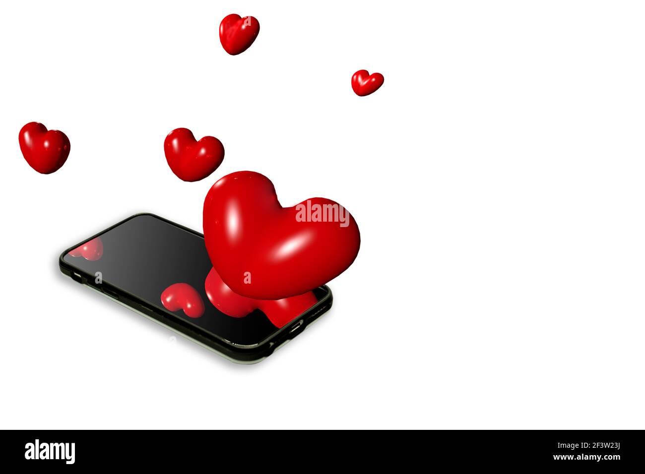 Hearts floating in the air from the cell phone love and technology in Mexico city Stock Photo