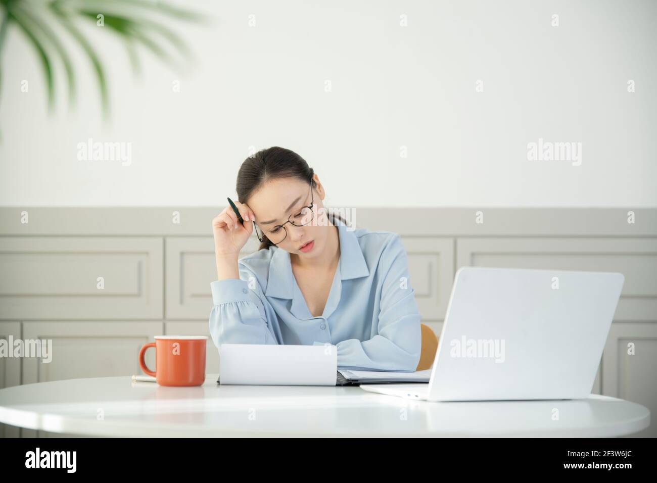 remote work, working at home concept of Asian woman in smart casual