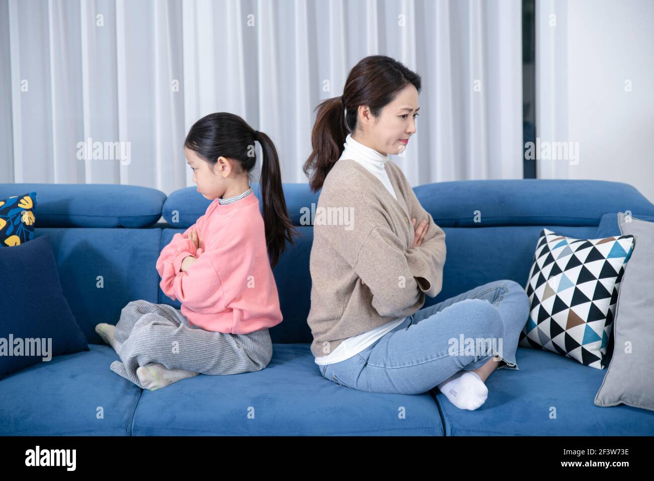 Asian mom and daughter concept with miscommunication, troubles, fight Stock Photo