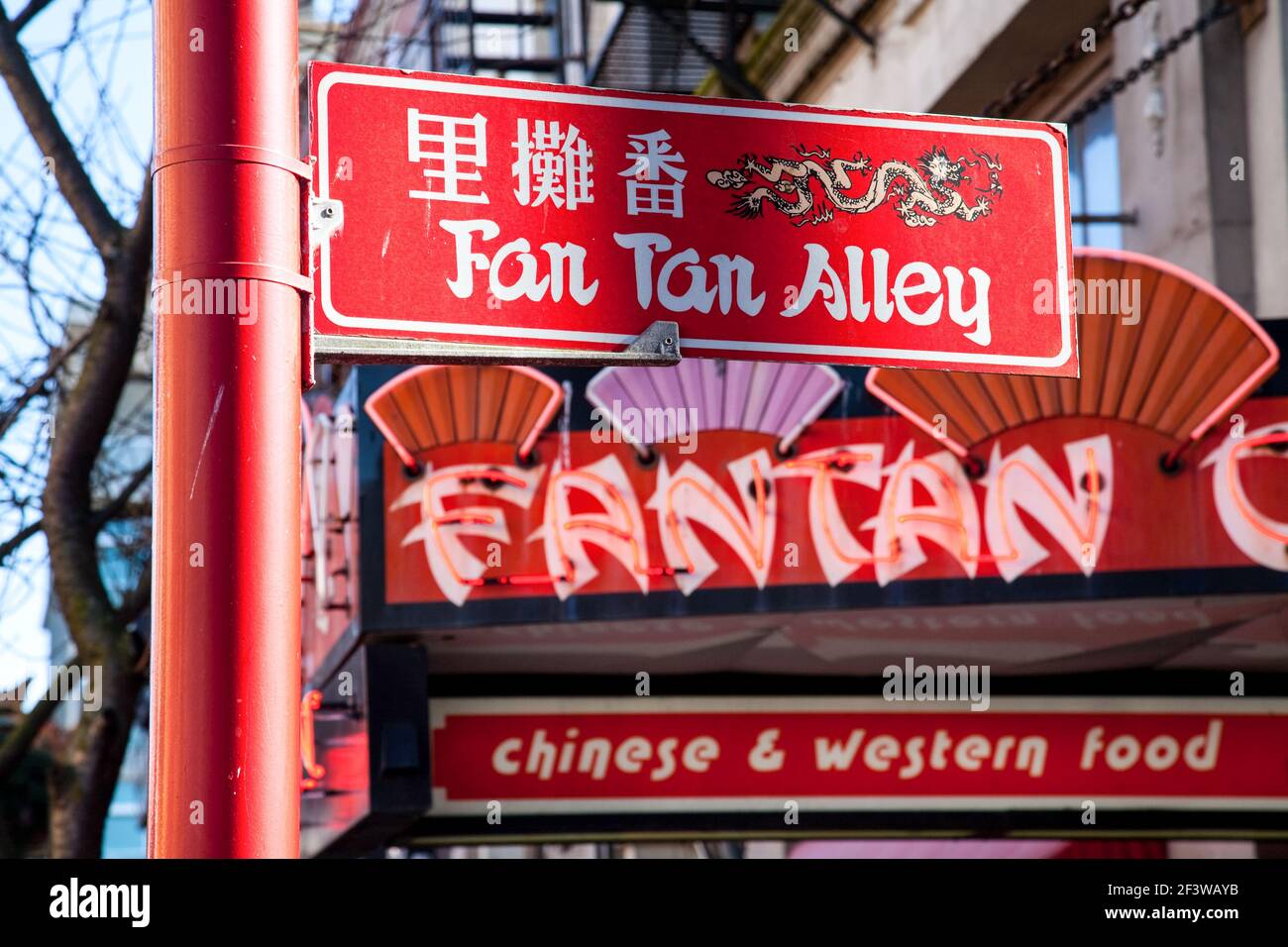 sign pointing to Fan Tan Alley, Chinatown, Victoria, Vancouver Island, British Columbia Stock Photo