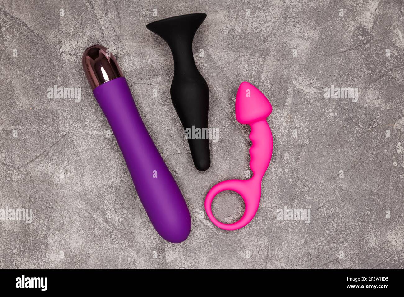 Sex toy for adult, design dildo vibrator on grey background Stock Photo -  Alamy