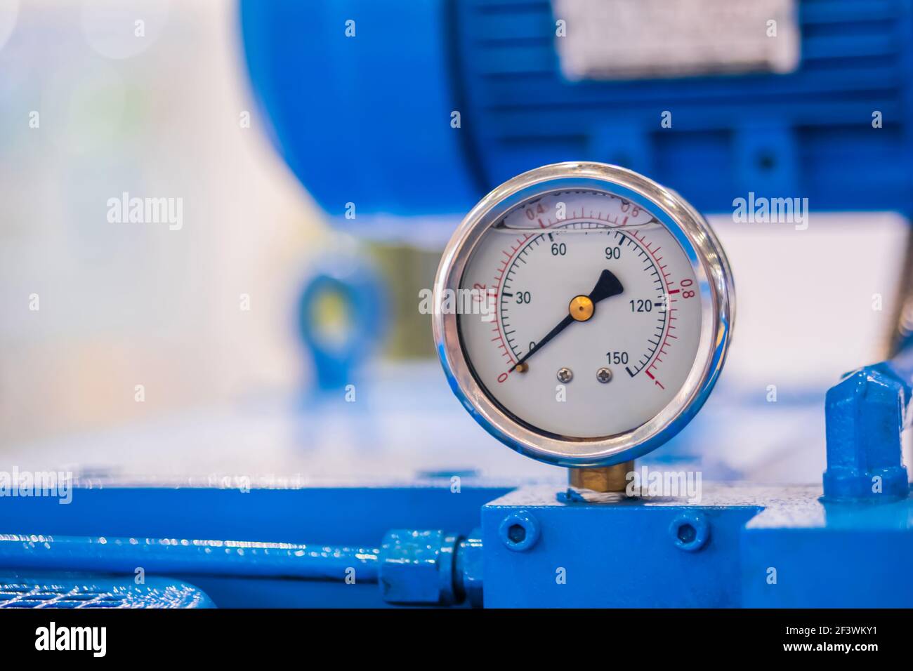 Glycerin pressure gauge for measuring fluid condition at plant, facory - close up. Industrial, electronic, technology equipment concept Stock Photo