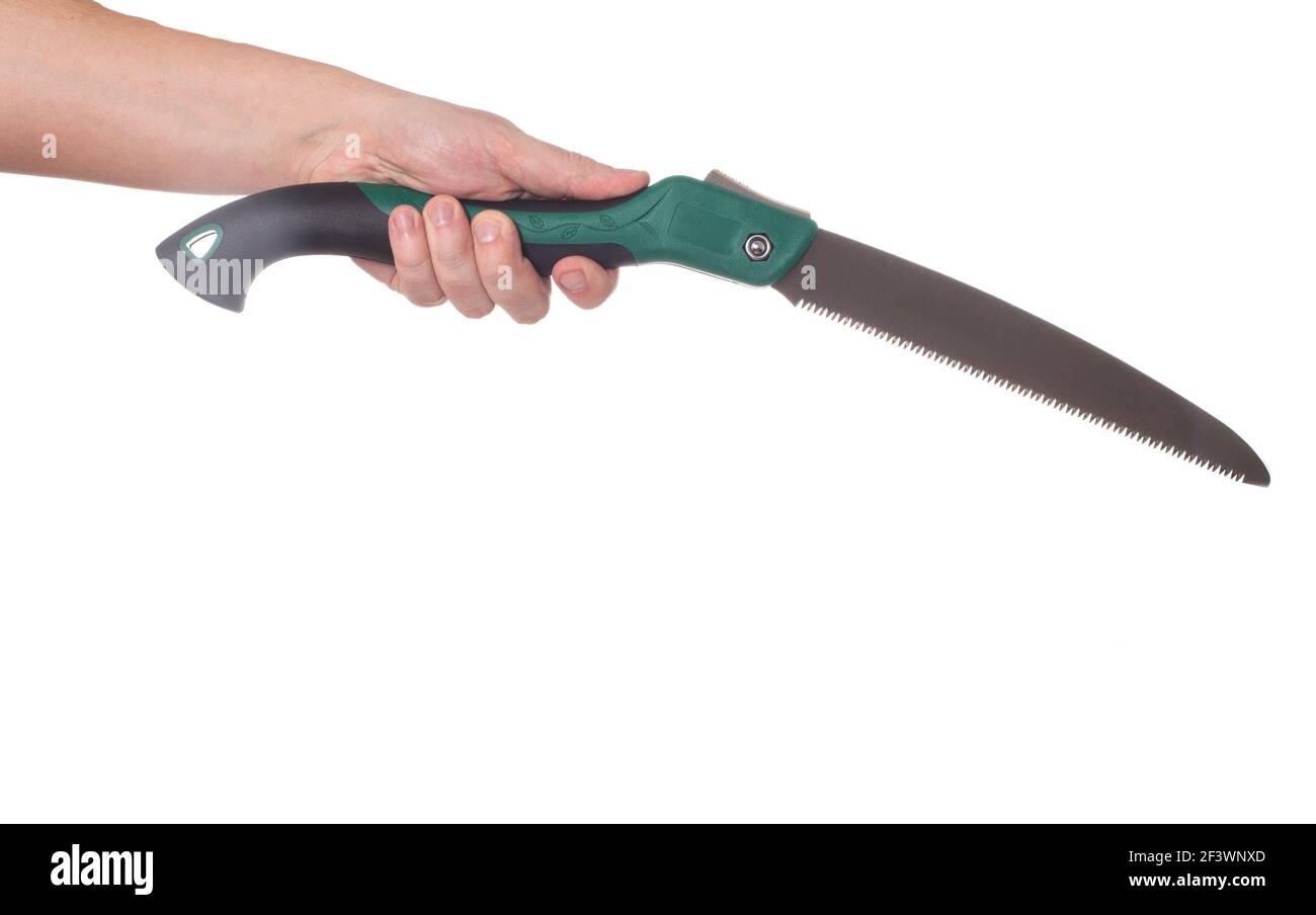 Man holding a lopper saw in hand on a white background, close-up, isolate, equipment Stock Photo