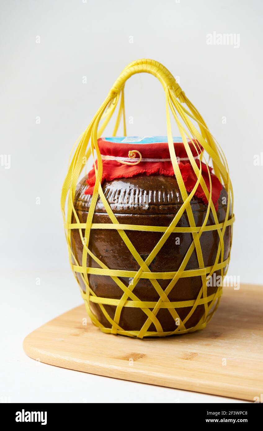 Round bamboo basket With fermented jars Stock Photo