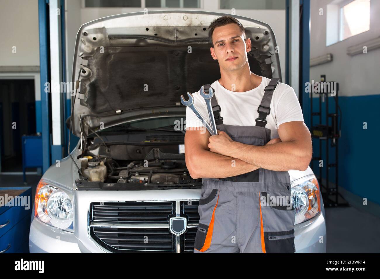 Handsome young man tools hi-res stock photography and images - Alamy