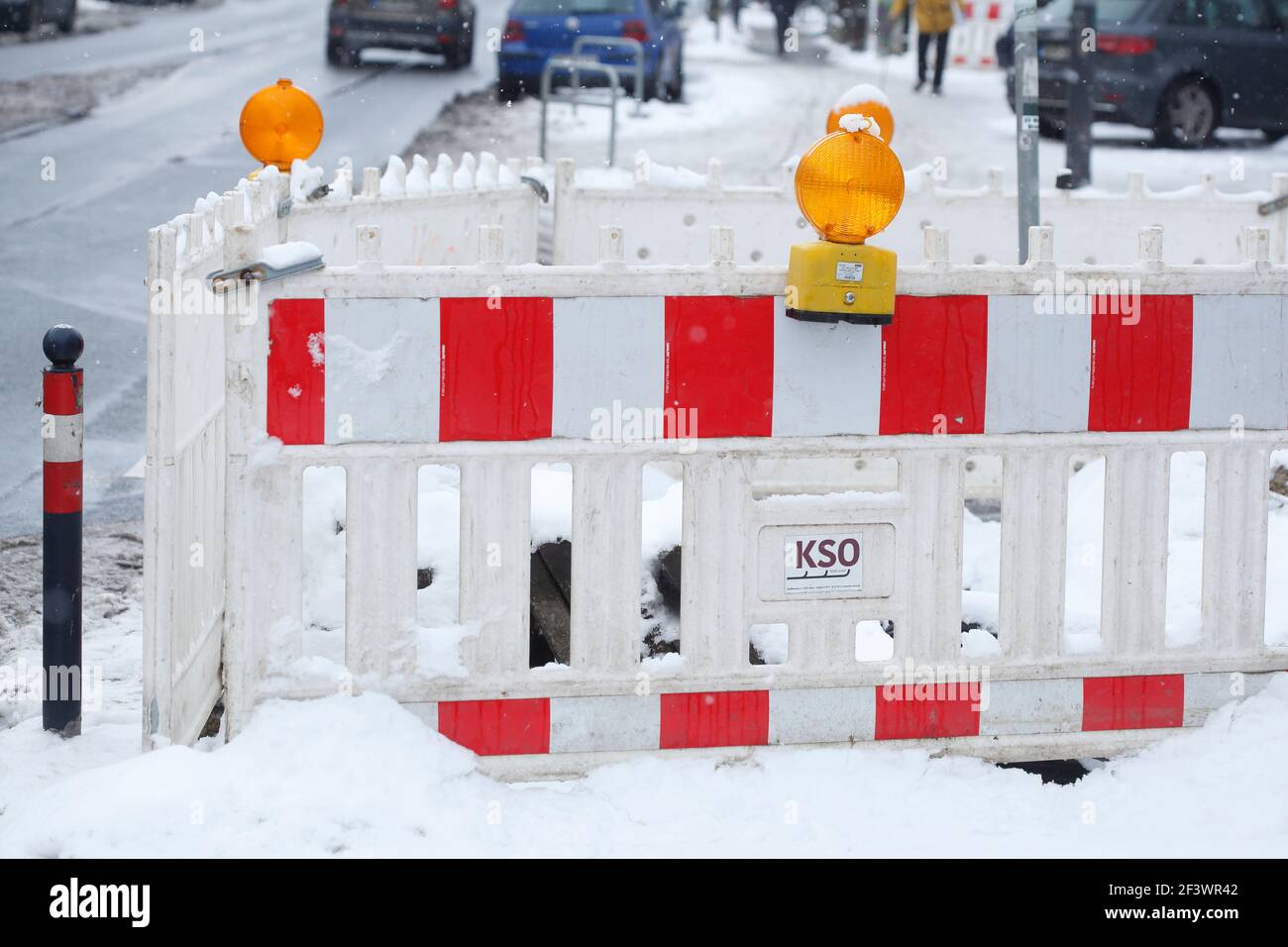 Snowy construction site barrier , Bremen, Germany Stock Photo