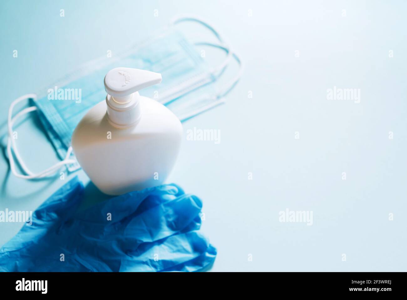 Face mask with hand sanitizer bottle, liquid soap dispenser and latex ...
