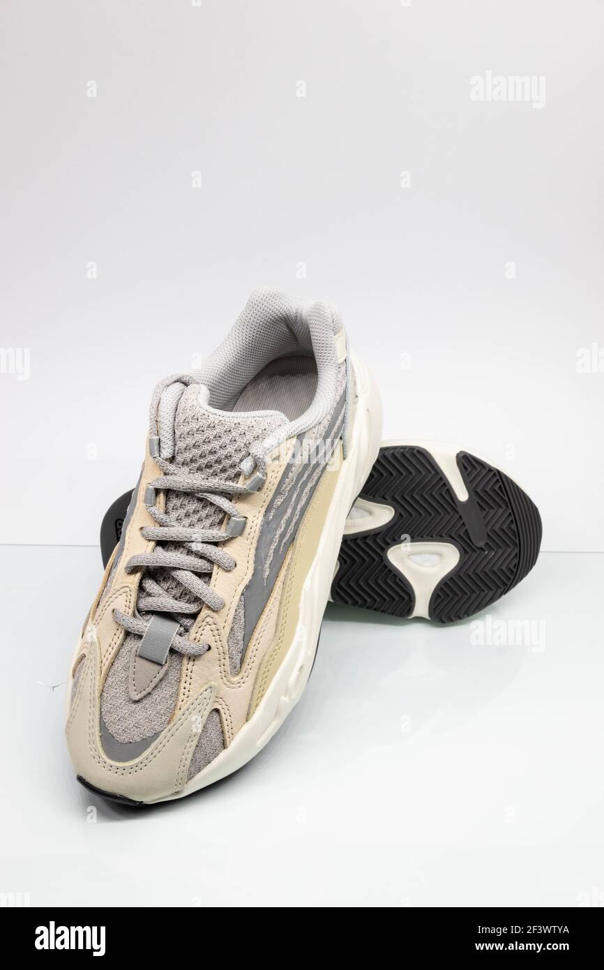 WARSAW, POLAND - Mar 16, 2021: Adidas Yeezy boost 700 V2 Cream. Famous  limited collection sneakers. Adidas running shoes isolated on a white  backgroun Stock Photo - Alamy