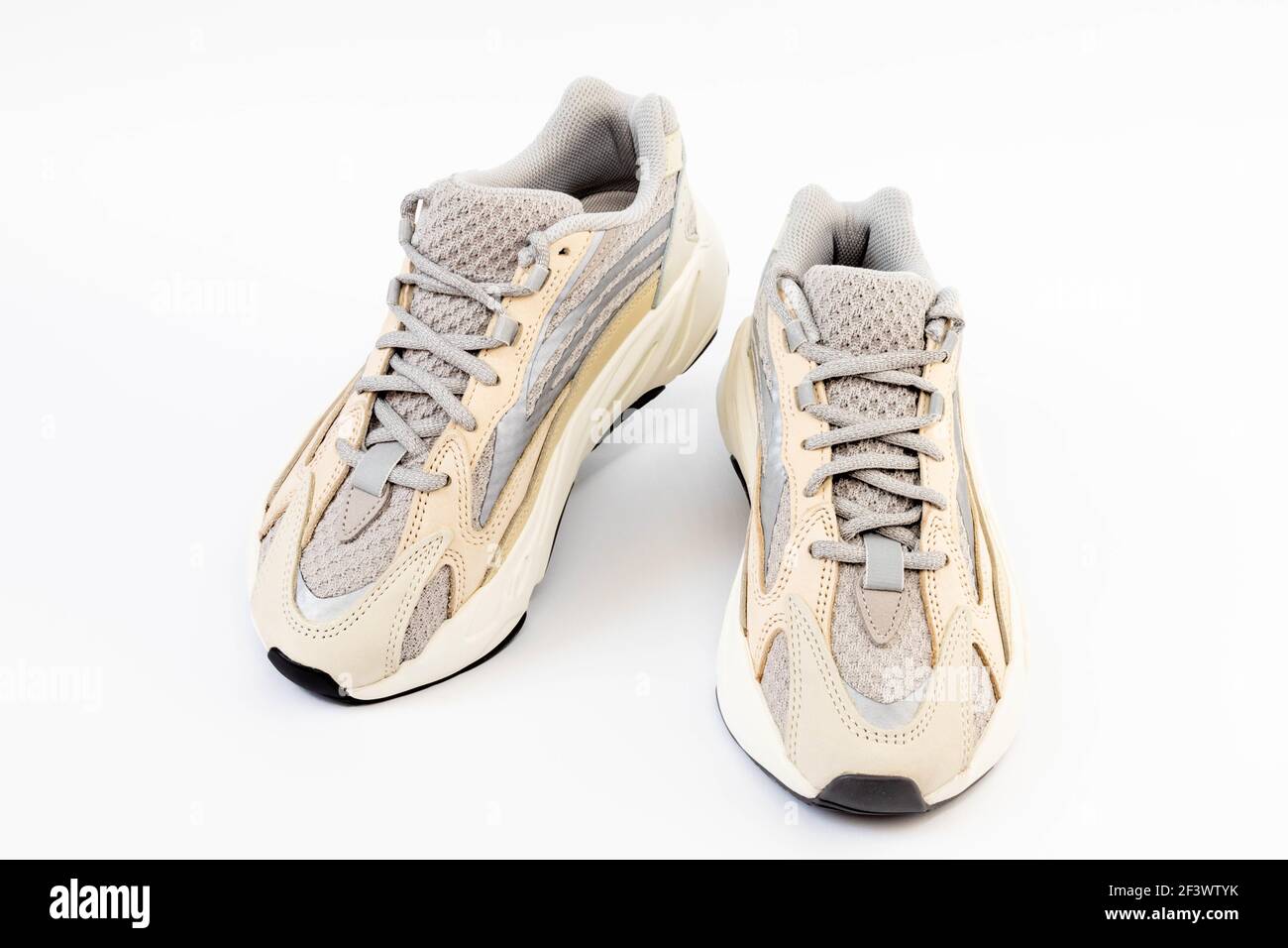 WARSAW, POLAND - Mar 16, 2021: Warsaw, PolAdidas Yeezy boost 700 V2 Cream. Famous limited collection sneakers. Adidas running shoes isolated on a whit Stock Photo
