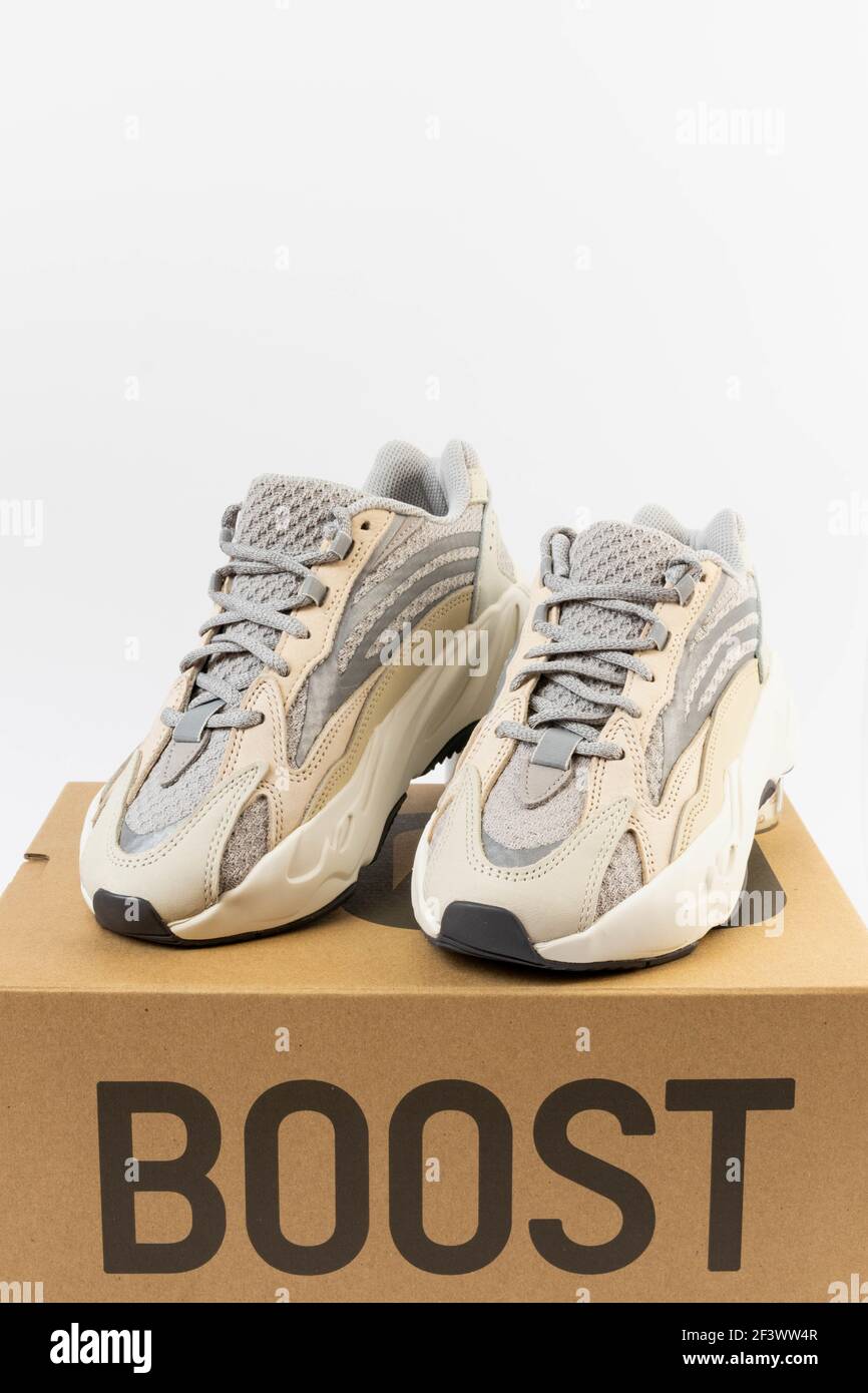 WARSAW, POLAND - Mar 16, 2021: Adidas Yeezy boost 700 V2 Famous limited collection sneakers with box. Adidas running shoes isolated on a white Stock Photo - Alamy