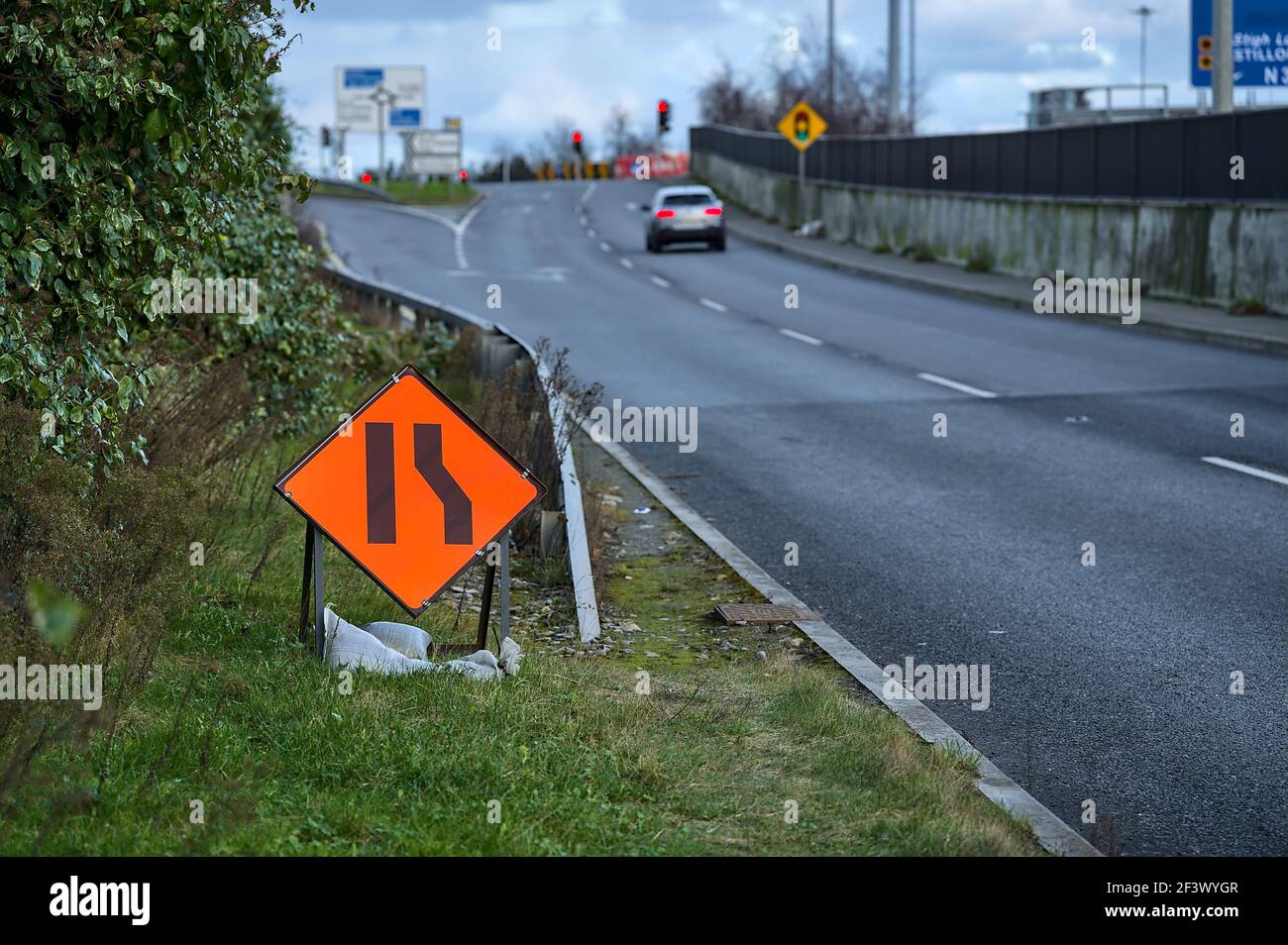Temporary road sign indication road narrowing from right, Dublin, Ireland Stock Photo Alamy