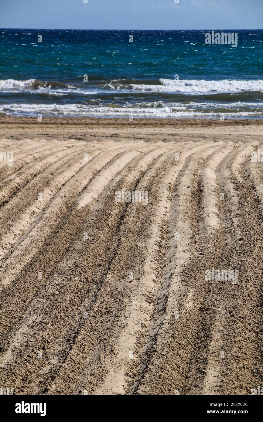 Sand racked texture on the beach in the morning Stock Photo - Alamy