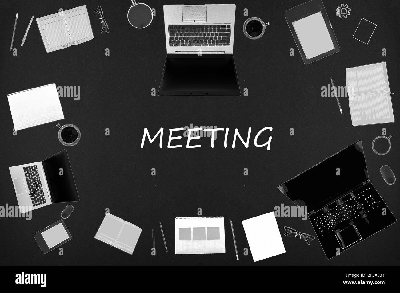 Meeting concept. Top layout of drawings of laptops, notepads, coffee, different business stuff on black background. Stock Photo