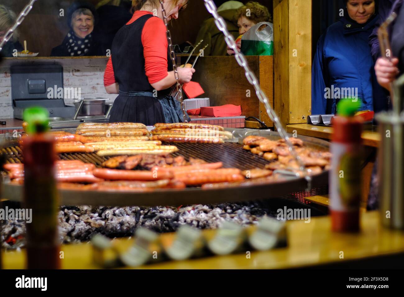 Bonn, Germany - December 21, 2017 : Sausages and meat on a big grill at the  Christmas market in Bonn Germany Stock Photo - Alamy